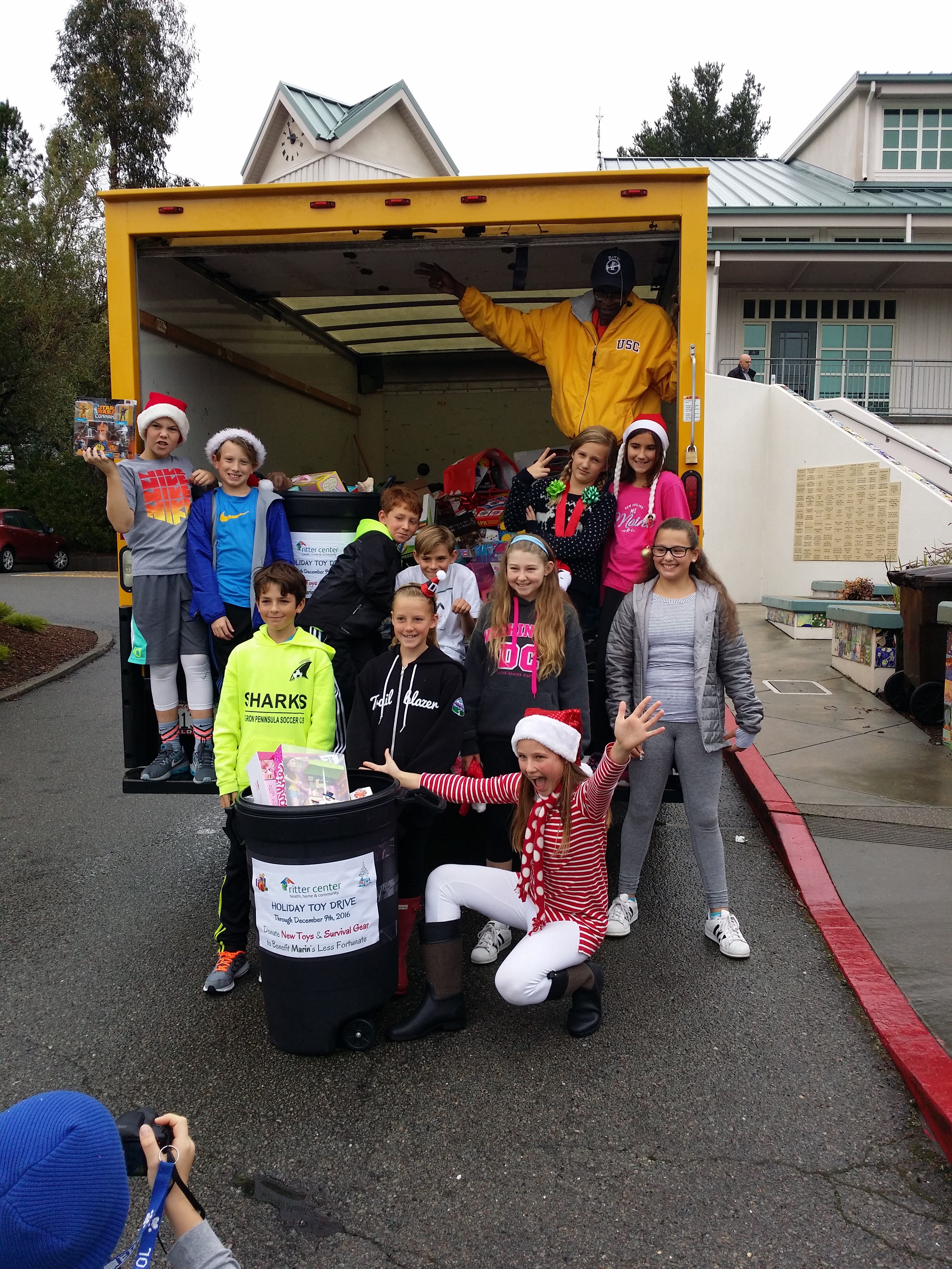 Bel Aire School students helping to load all their donations!